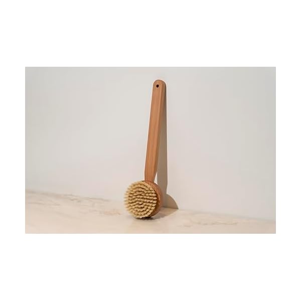 Get your skin glowing with this must-have wooden body brush! The removable handle makes it easy to exfoliate from head to toe in the shower. Say hello to smooth, radiant skin! ✨🚿 #showeressential #glow