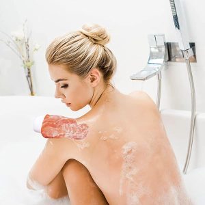 Get silky smooth skin with these exfoliating gloves! Perfect for a spa-like shower experience. Say goodbye to dead skin and hello to glowing skin! #skincare #exfoliate #glowingskin