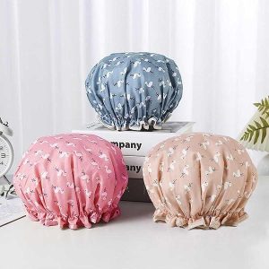 Stay cute and dry with these trendy double-layer bath caps! Perfect for keeping hair dry and ears covered. Plus, they're kitchen oil-proof too! #bathcaps #showercaps #haircare