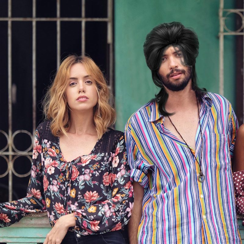 Get groovy with this black mullet wig! Perfect for 70s/80s vibes, rockin' out, or Halloween fun 🎃 Rock your next costume party with this long, curly wig! #halloweencost