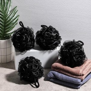 Get your skin feeling soft and smooth with this pack of 4 extra soft shower puffs! Perfect for scrubbing and exfoliating, this black shower sponge is comfortable for men, women, and babies alike. #skincare #softskin #