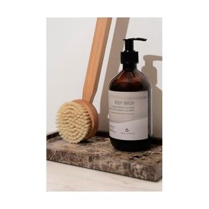 Get your skin glowing with this must-have wooden body brush! The removable handle makes it easy to exfoliate from head to toe in the shower. Say hello to smooth, radiant skin! ✨🚿 #showeressential #glow